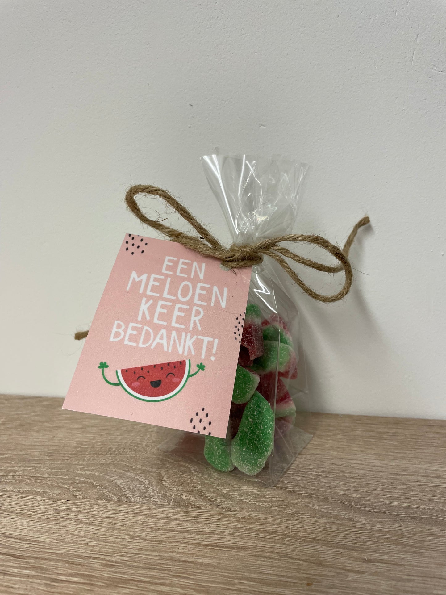 Cellofaanzakje met watermeloenschijfjes " een meloen keer bedankt! "