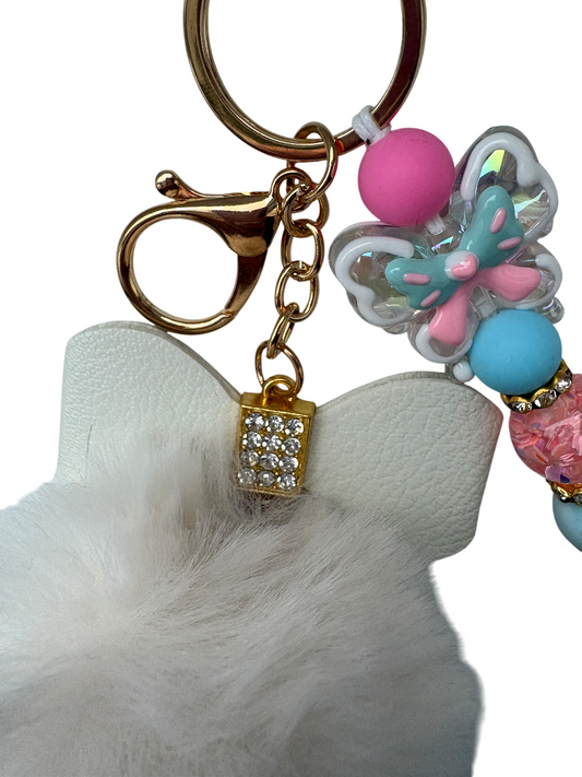 Sleutelhanger deluxe met strik pompom en vlinder