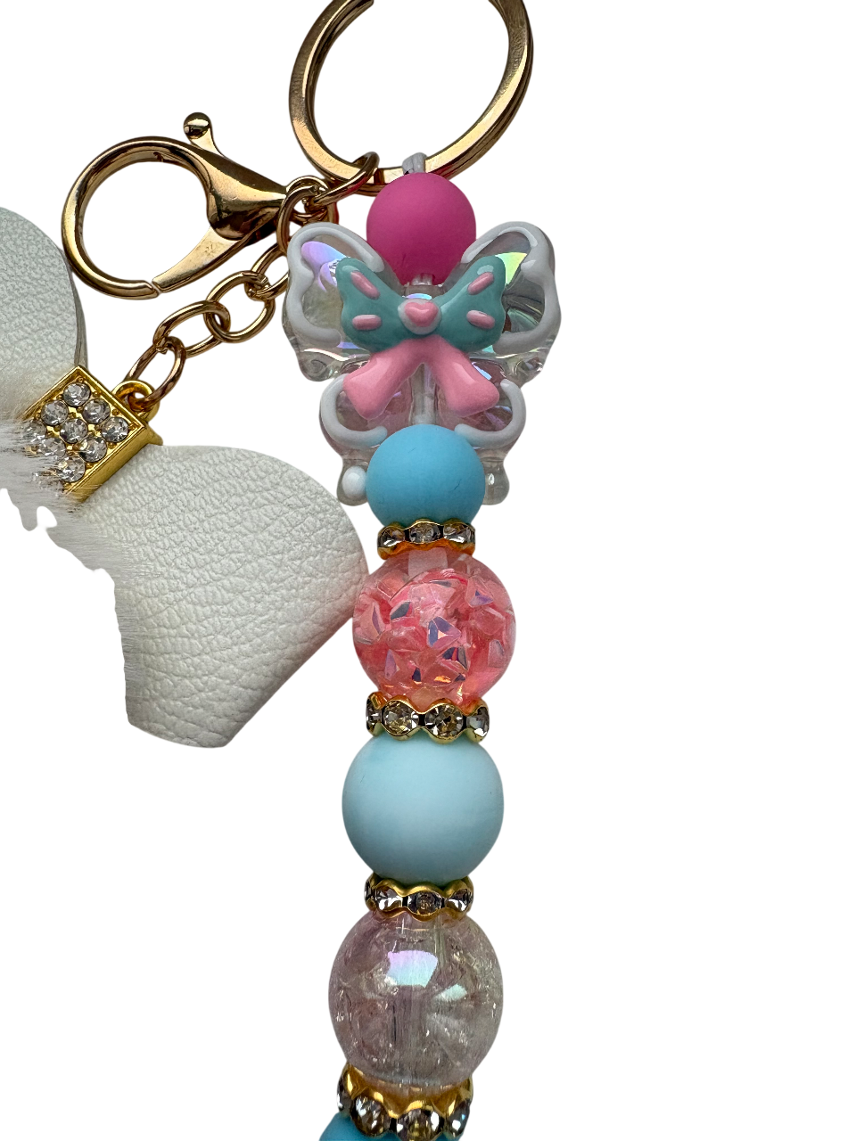 Sleutelhanger deluxe met strik pompom en vlinder