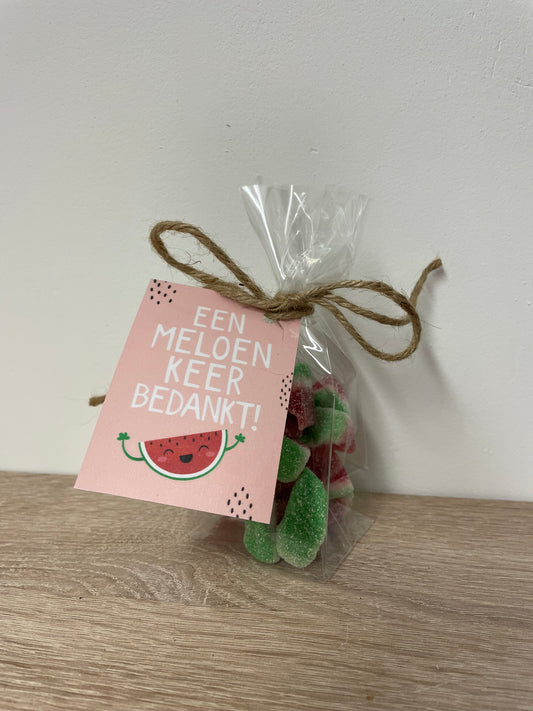 Cellofaanzakje met watermeloenschijfjes  " een meloen keer bedankt! "