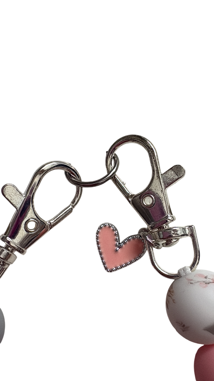 Telefoonketting (pols) roze/grijs met bedelhartje