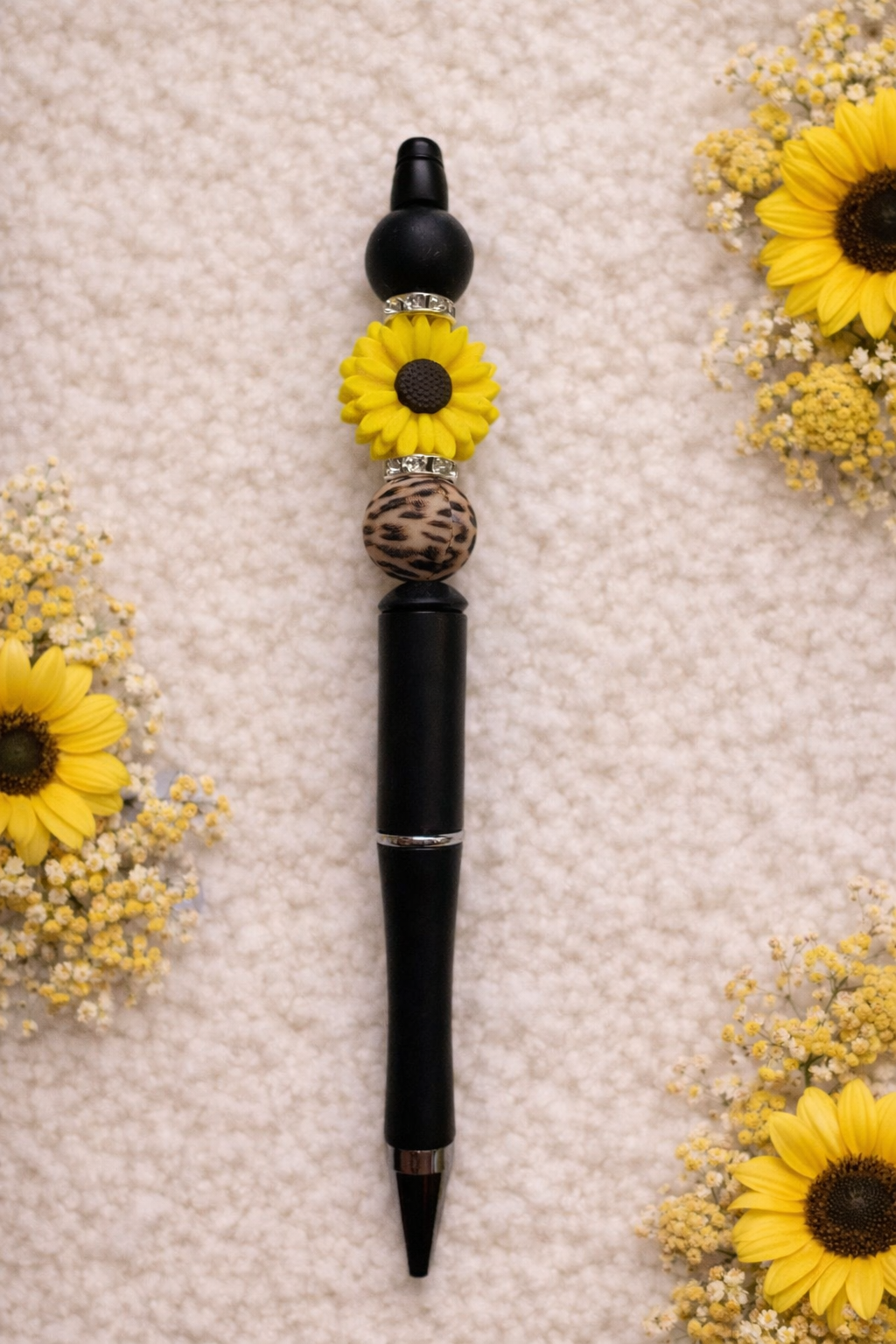 Kralenpen zwart met zonnebloem geel
