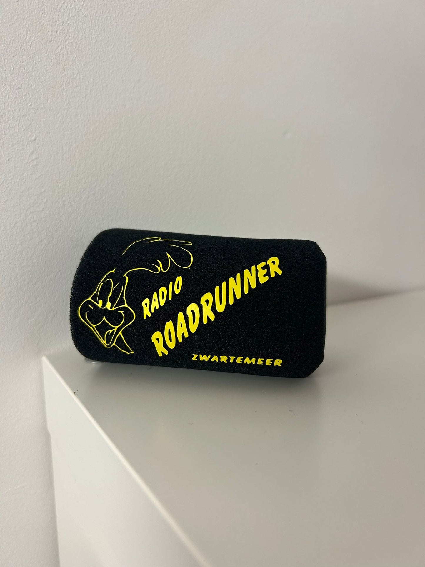 Plopkap met eigen logo sticker